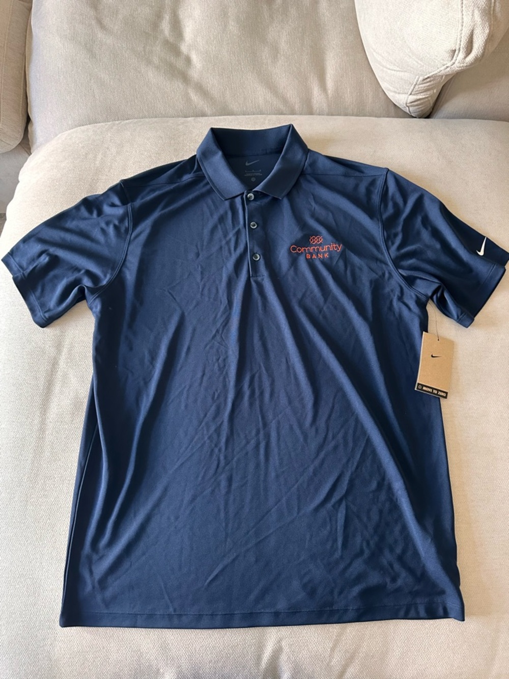Nike Men's Navy Polo with Embroidered Community Bank Logo
